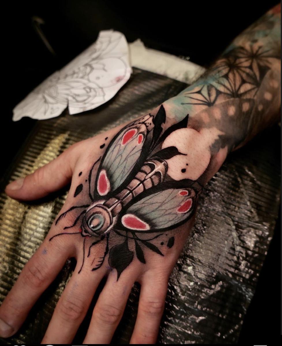 Fly Hand Tattoo by Romo