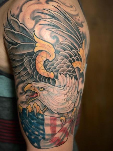 Black shaded globe eagle and anchor tattoo on arm for men