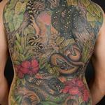 Tattoos - back tattoo of a snake - 99782