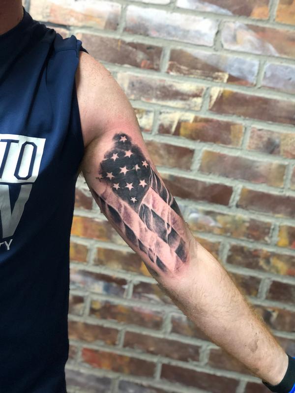 40 Famous Black And Grey Flag Tattoos