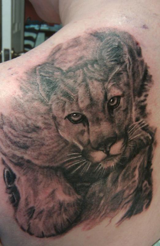 chest and arm tattoo mountain lionTikTok Search