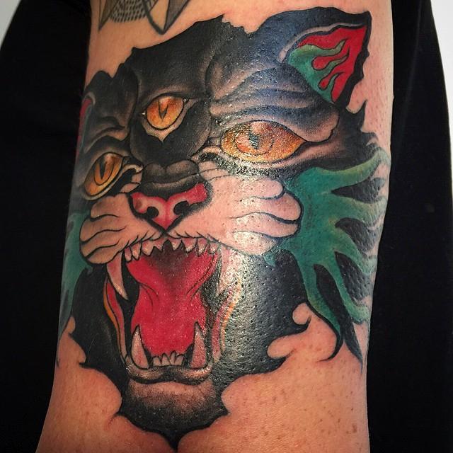 Tattoo studio in Dorset UK  3 eyed cat by Craig Bartlett at Adorned Tattoo 