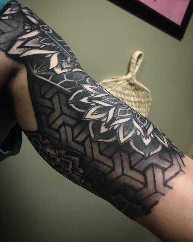Underarm view of a finished half sleeve by Christina Walker Tattoos