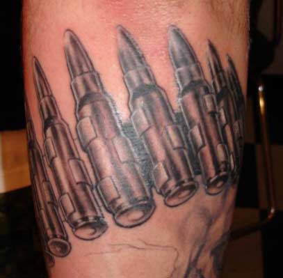 Bullet arm band tattoo by Christopher Allen: TattooNOW