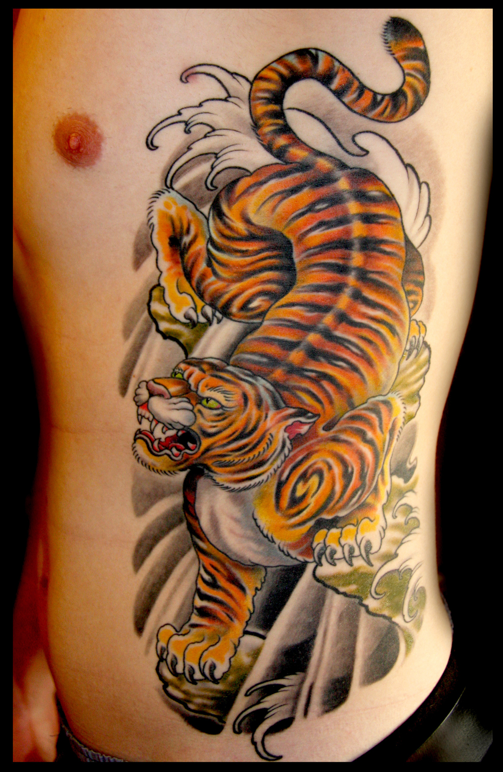 Tiger head on ribs tattoo myke chambers  Tattoo by Myke Cha  Flickr