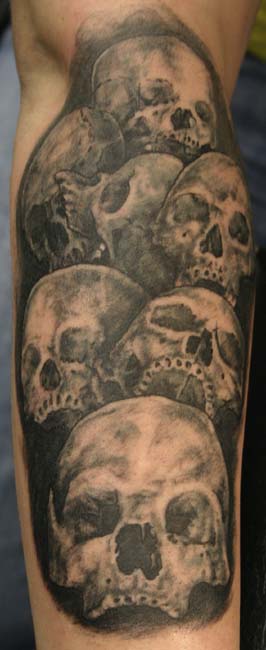Pile of Skulls by Dan Henk: TattooNOW