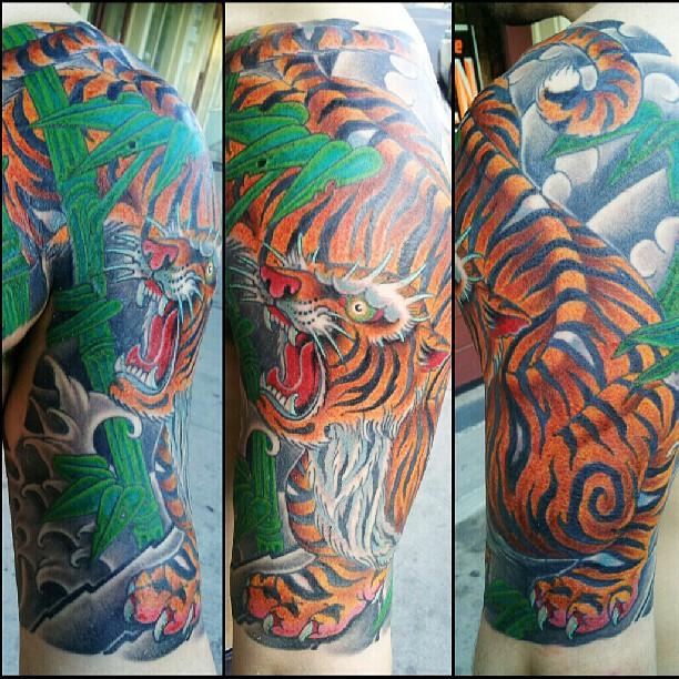 Tiger sleeve by Kelly Edwards: TattooNOW