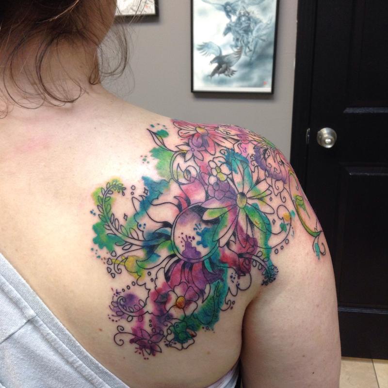 Disney Watercolor Illustrative Flower Orlando inspired tattoo by  Orlando Tattoo Artist  Cortni West