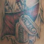 Tattoos - skin rip meat tag - 111637