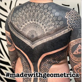 Cory Ferguson - geometric back tattoo
