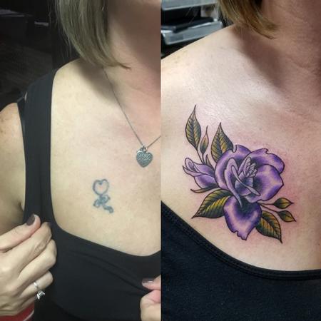 Rose covering heart tattoo