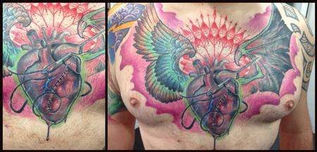 Jose Gonzalez - Custom heart and wings new school color chest tattoo