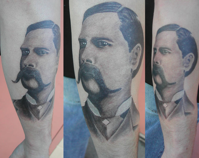 6. Doc Holliday's iconic mustache tattoo - wide 7