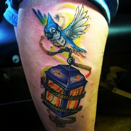 Tattoos - Blue jay holding a lantern 'light up the darkess
