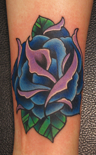 Traditional-ish blue rose arm tattoo by Jon von Glahn: TattooNOW