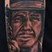 Tattoos - Charles Bronson black and grey portrait arm tattoo - 55097