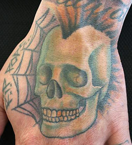 Skull with Mohawk by Julian Zeff: TattooNOW