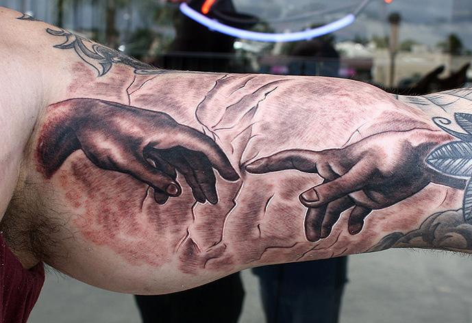 RedHouse Tattoo and Body Piercing  Beautiful rendition of The Creation of  Adam by