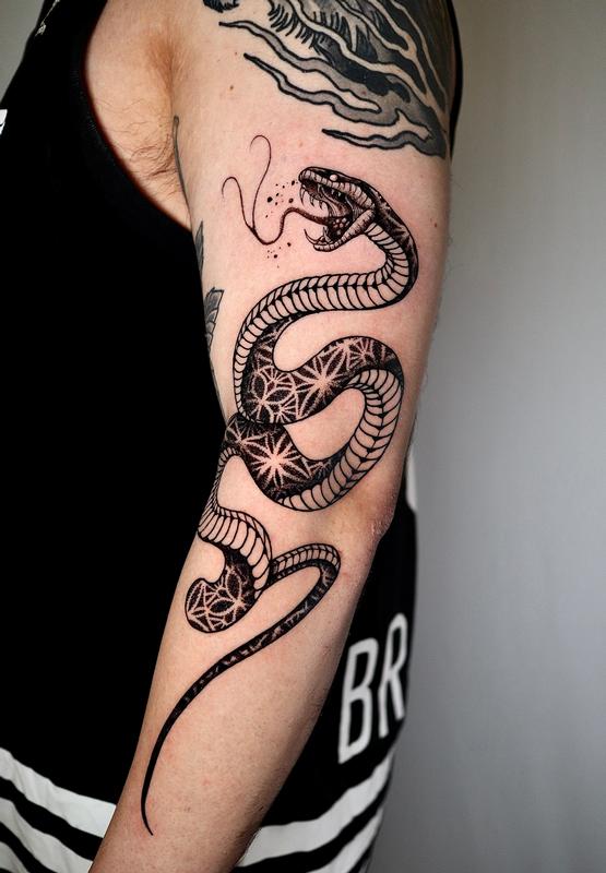 Snake arm tattoo by Kuro Pattern
