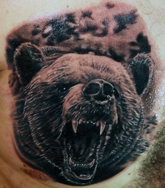 Bear tattoo a symbol of strength and protection 