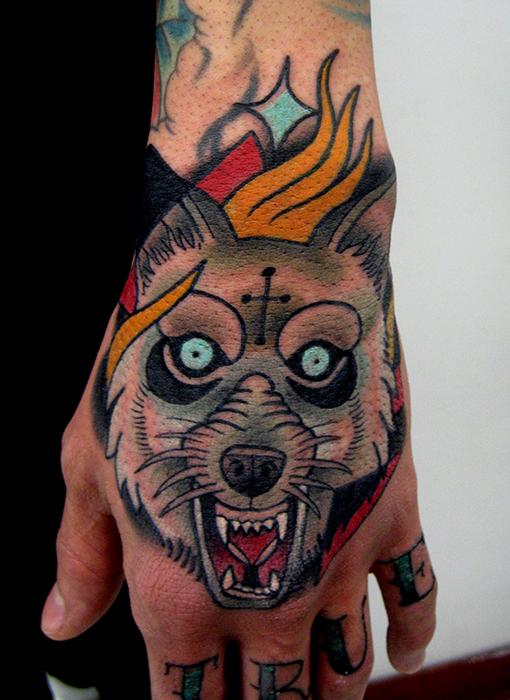 wolf hand tattoo by Jonathan Montalvo: TattooNOW