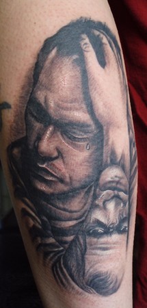 Jamie Cross - Ledger with Joker tattoo