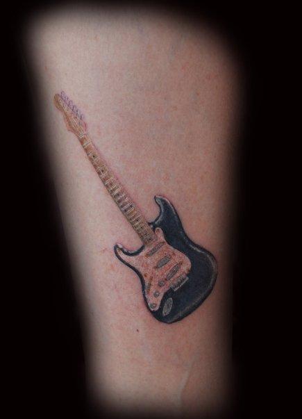 27 Guitar Tattoos You'll Either Love or Hate