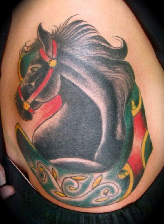 horse with a horse shoe traditional tattoo by Kike Castillo TattooNOW