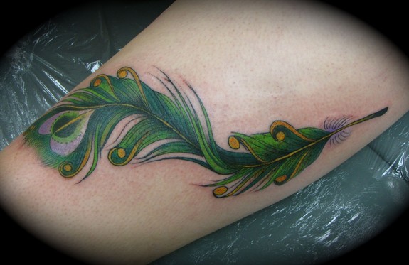 peacock feather tattoo by Kike Castillo: TattooNOW