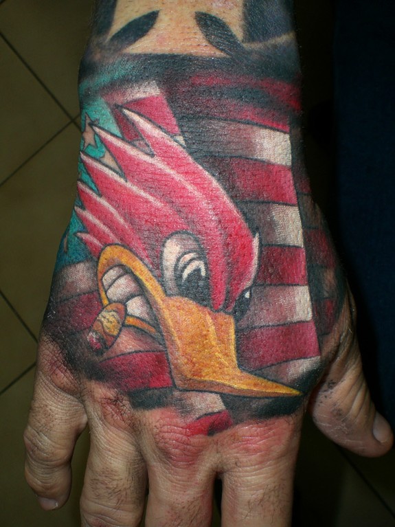 Woodpecker Hand by Daniel Rosini: TattooNOW