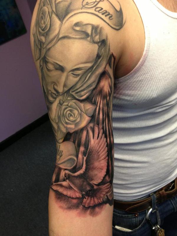 Inner Bicep Religious Tattoo