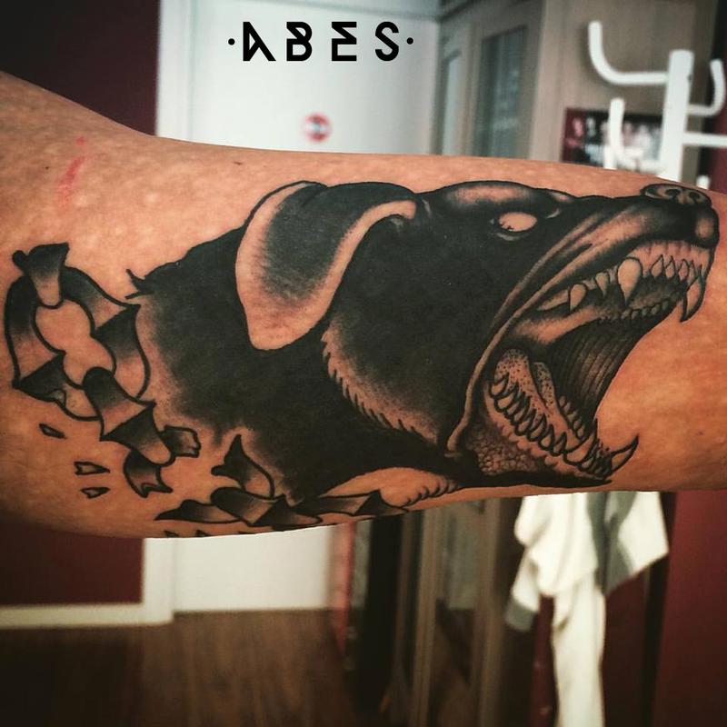 Black dog done by Jon Koon at artistic studio hair and tattoo