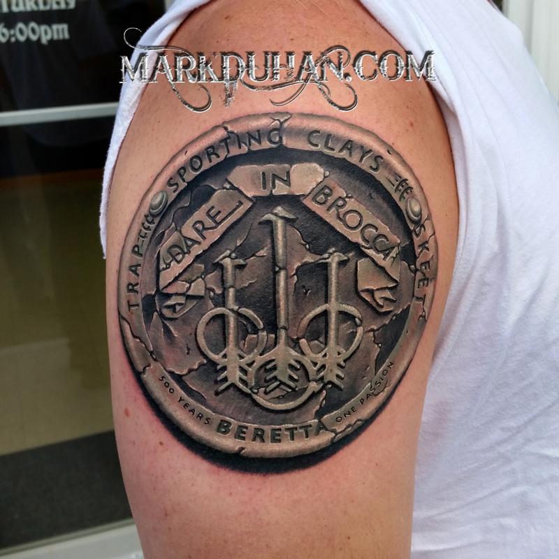 STONE BERETTA LOGO by Mark Duhan: TattooNOW