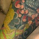 Tattoos - kirin with chrysanthemums, and skull - 128947