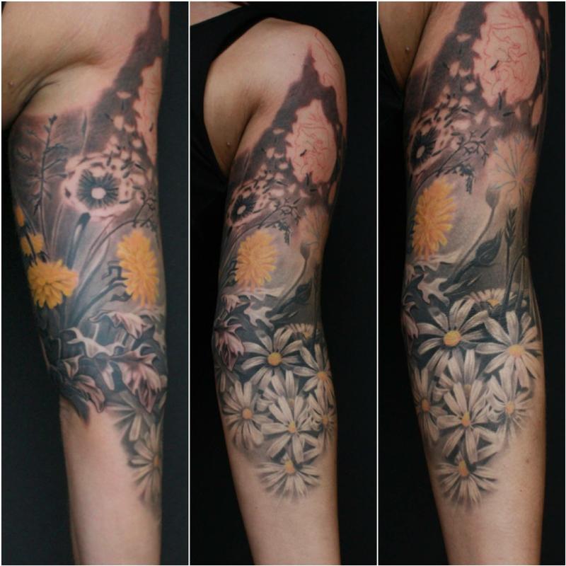 Half sleeve flowers in progress by Dennis Wehler TattooNOW