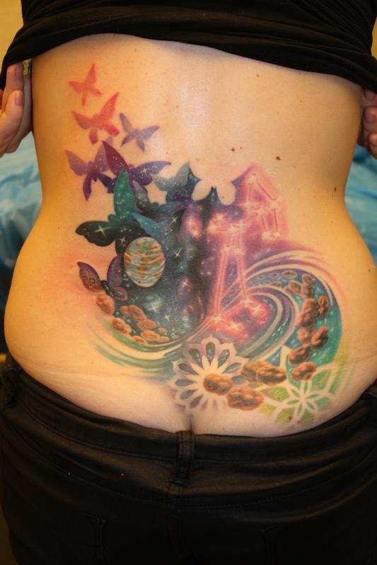 cover-up old tribal on lower back by Dennis Wehler: TattooNOW
