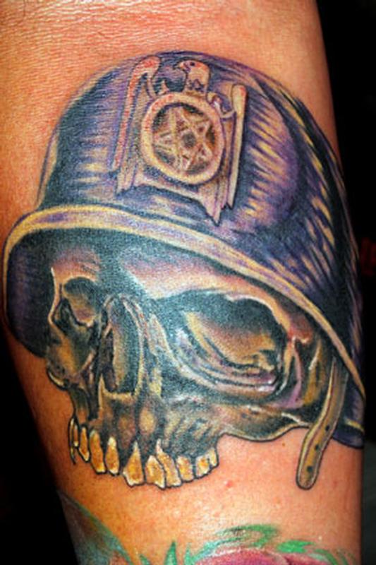Skull with helmet and Slayer eagle tattoo by Aran Campas: TattooNOW