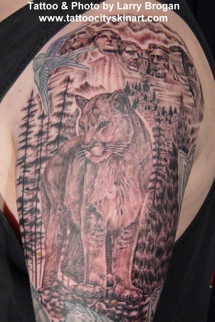 Cool Mountain Lion Tattoo Design