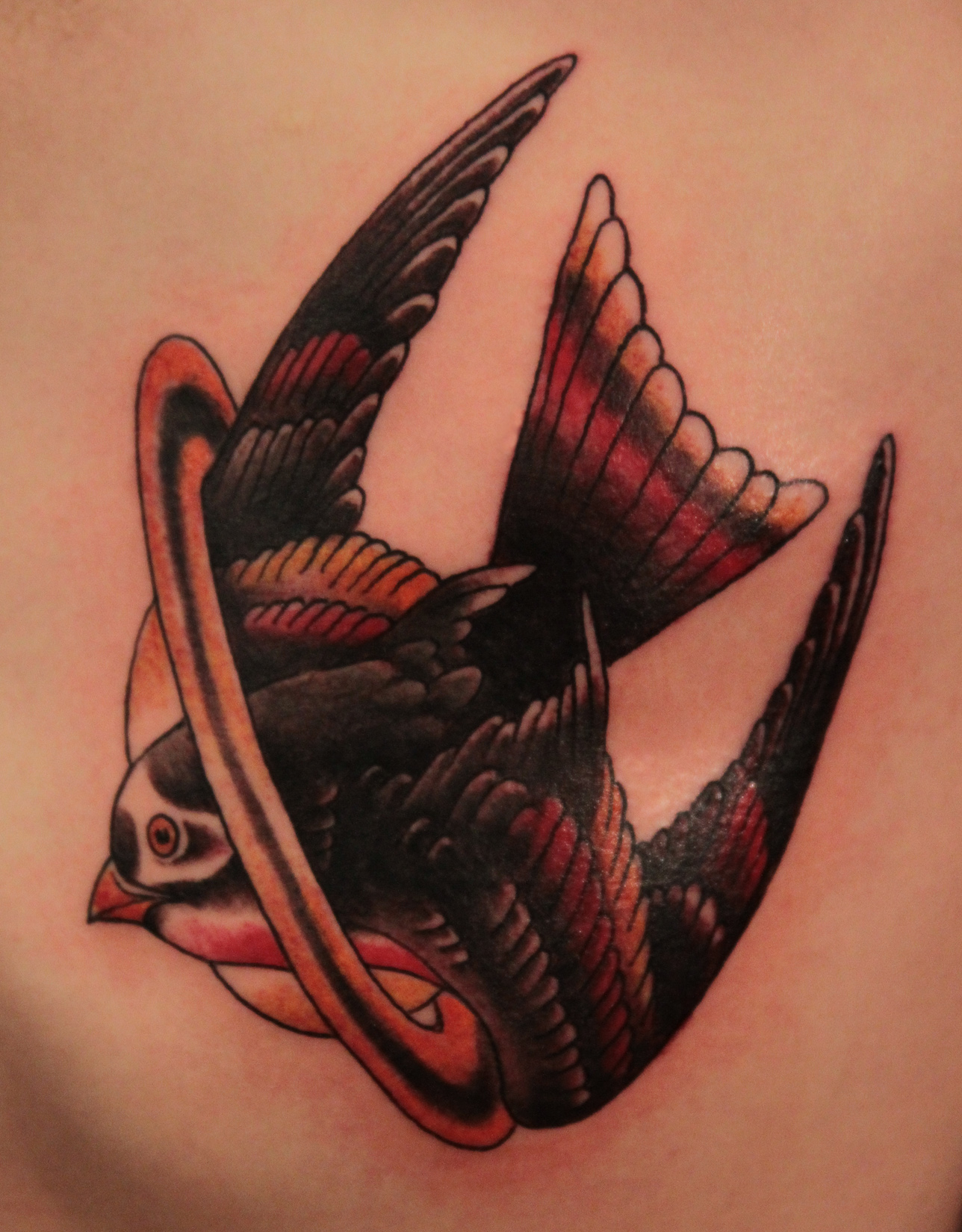 Bird Flying Through Saturn Tattoo by Gene Coffey TattooNOW