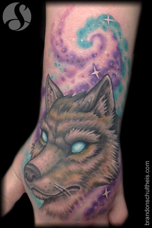 Wolf Hand Tattoo by Brandon Schultheis: TattooNOW