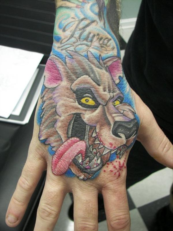 Wolf Hand Tattoo by Jeff Stevens: TattooNOW