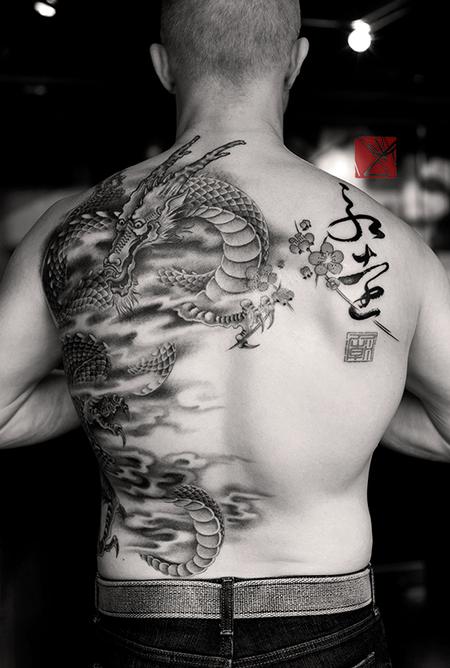 Cool Black Ink Dragon Tattoo On Women Full Back