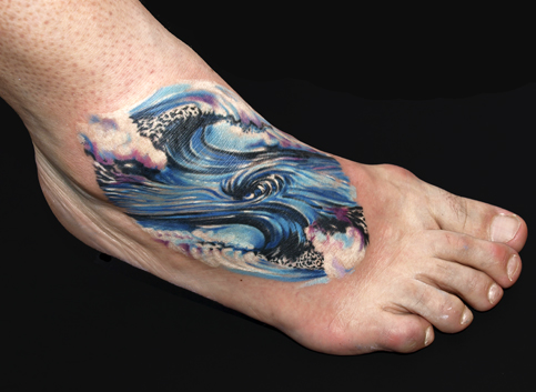 Wave on foot tattoo by Michele Turco: TattooNOW