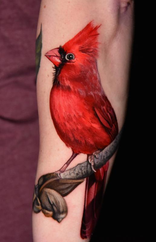 Microrealistic cardinal tattoo done on the inner arm