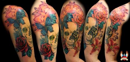 Tattoos - skull surrounded by flowers - 109642