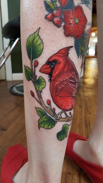 Cardinal red bird and cherry blossoms tattoo  Tattoos Cool tattoos Music  tattoo designs