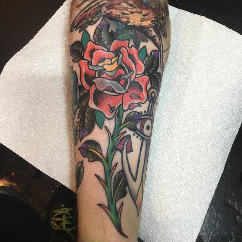 traditional rose tattoos sleeve