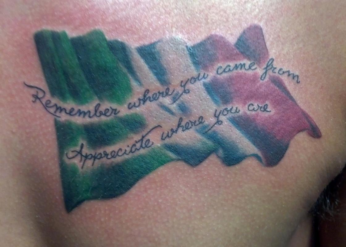 Italian flag on chest by Justin McCarty: TattooNOW