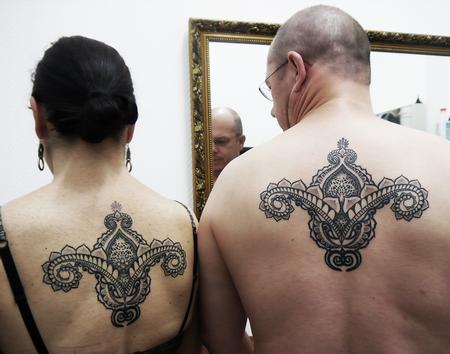 Obi - couple tattoo in bongo style indian traditional dotwork linework tattoo