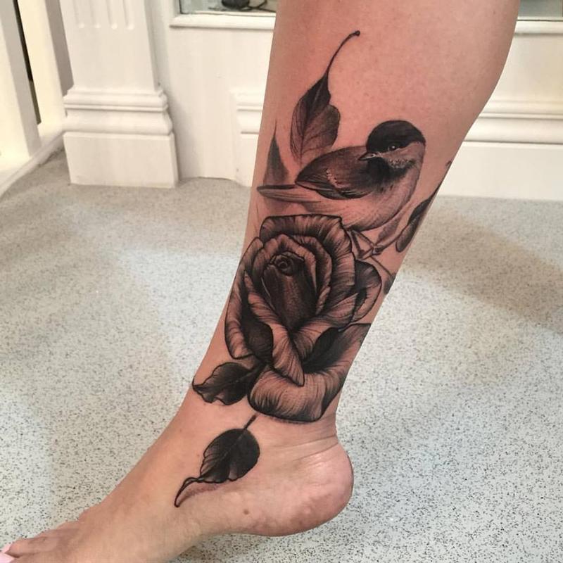 Tattoo tagged with flower white goldfinch black big animal red bird  rose mitchellallenden nature tatuaje tatuajes orange green  neotraditional upper arm brown  inkedappcom